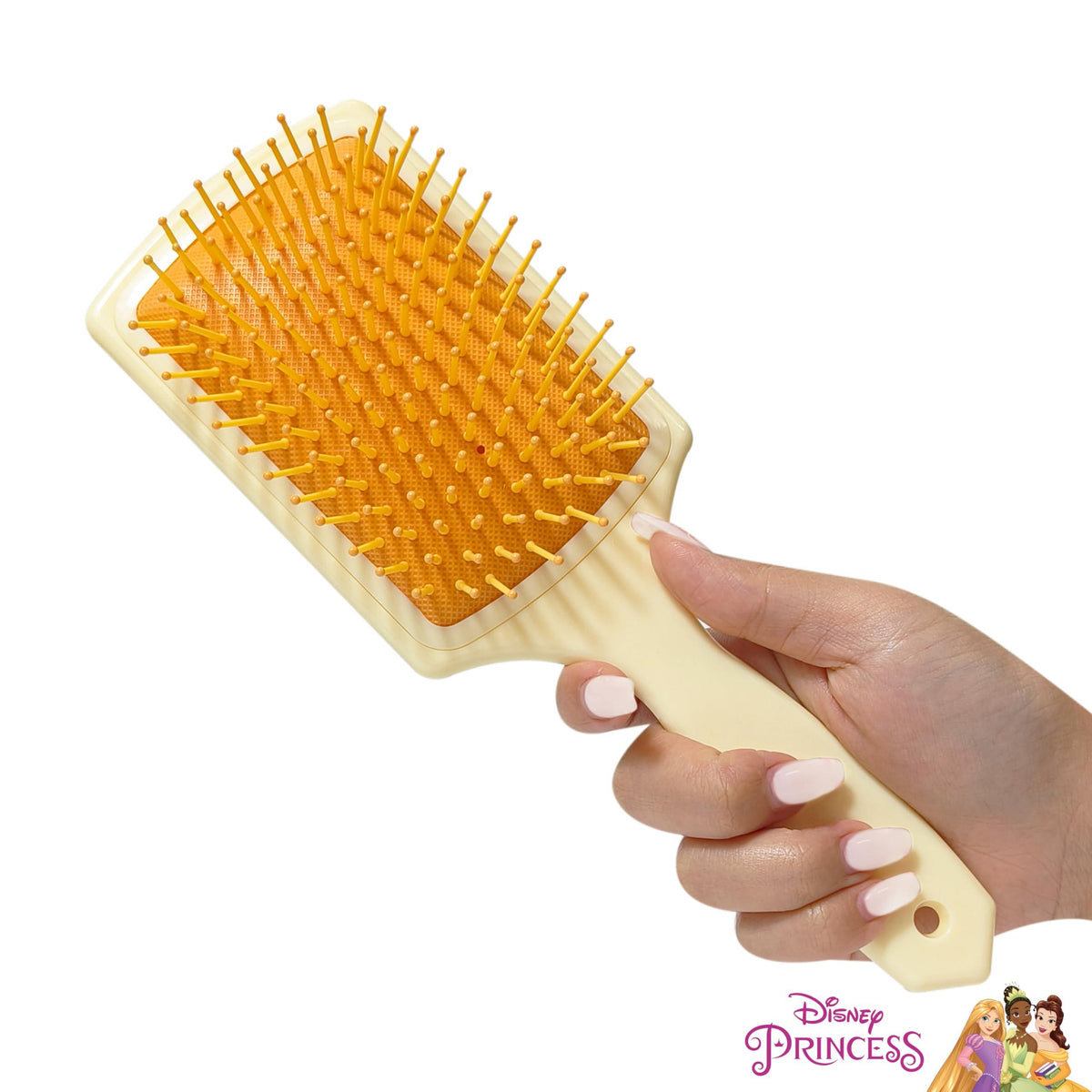 Disney Princess Paddle Brush for girls with yellow bristles, held in hand, official LuvHer Shop accessory
