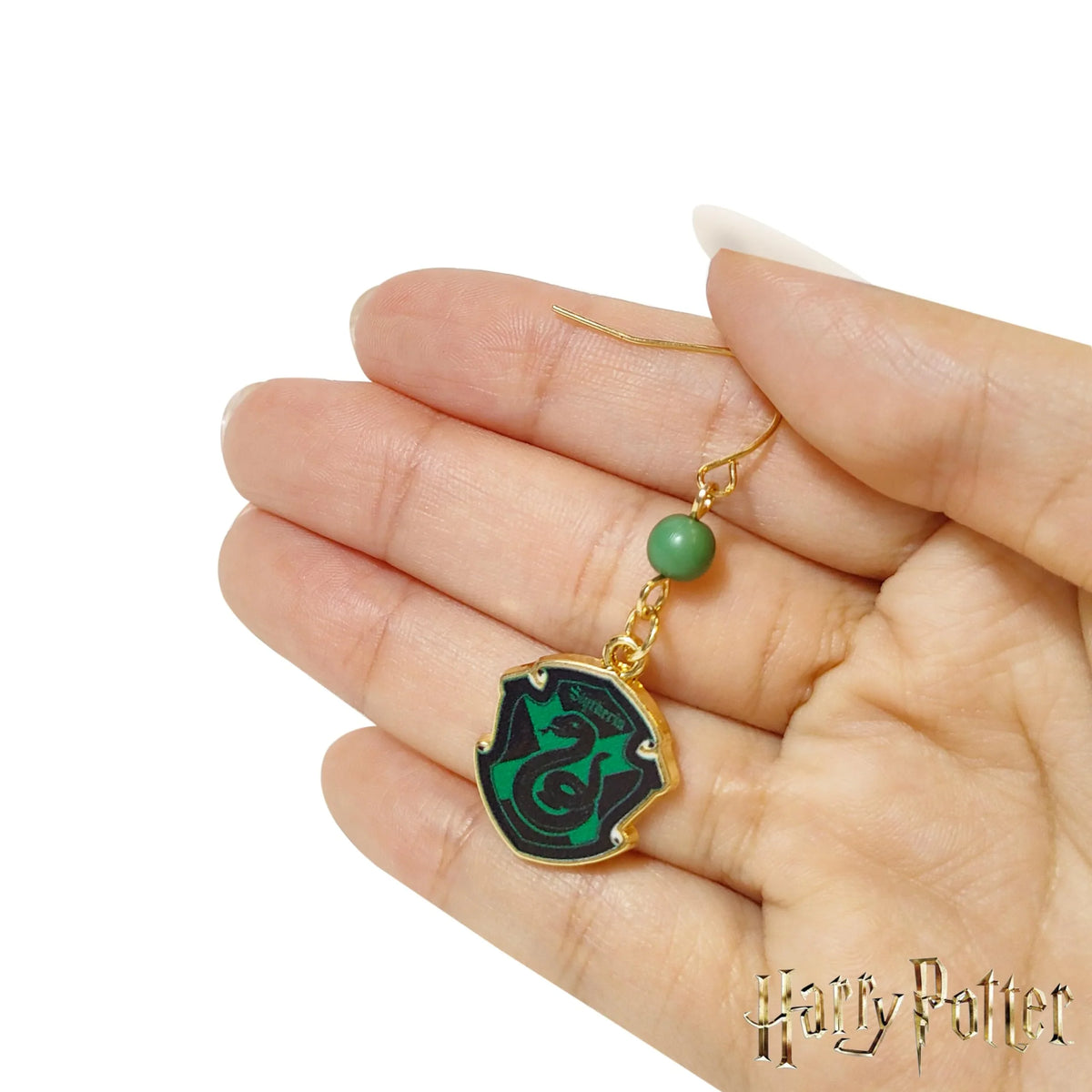 Harry Potter Slytherin earrings with gold hook and green bead on hand, LuvHer Shop accessory