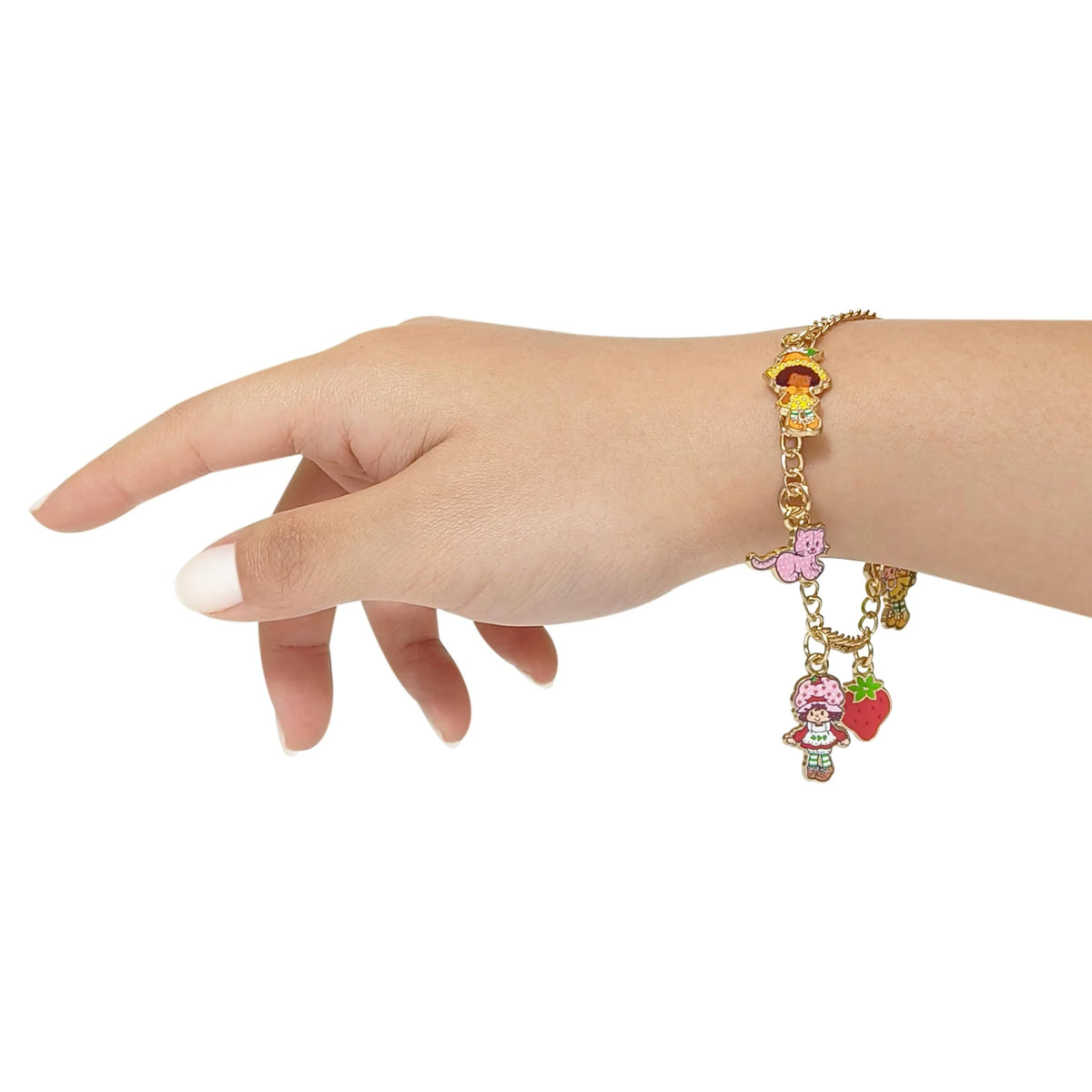 Strawberry Shortcake charm bracelet with colorful character and fruit charms on wrist