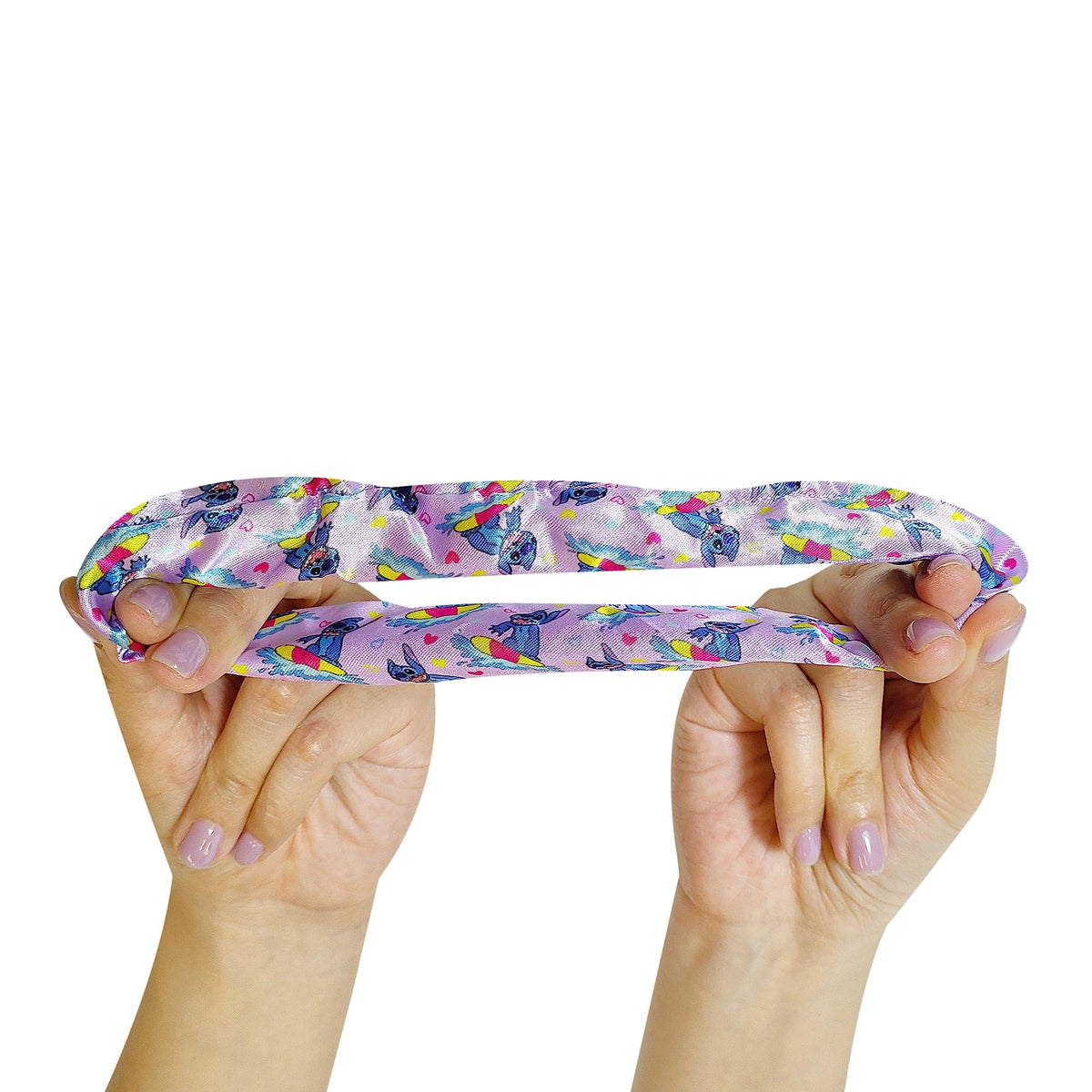 Stitch Heatless Curling Ribbon from LuvHer Shop held by hands, featuring Stitch print