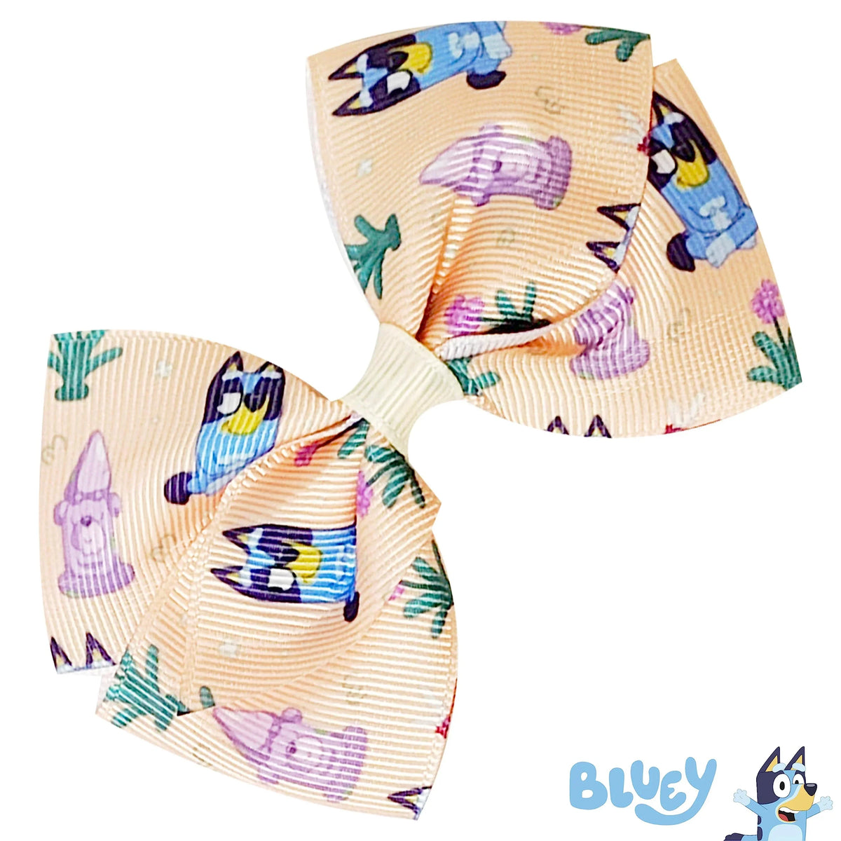 Bluey hair bow for girls with printed Bluey characters on a peach background, LuvHer Shop accessory