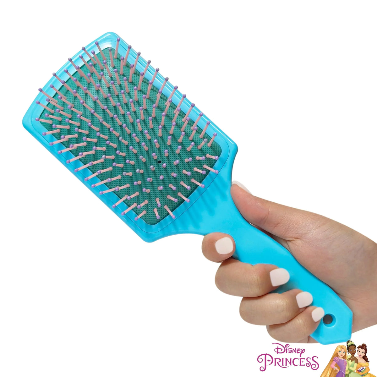 Hand holding a Disney Princess Paddle Hair Brush with blue handle from LuvHer Shop