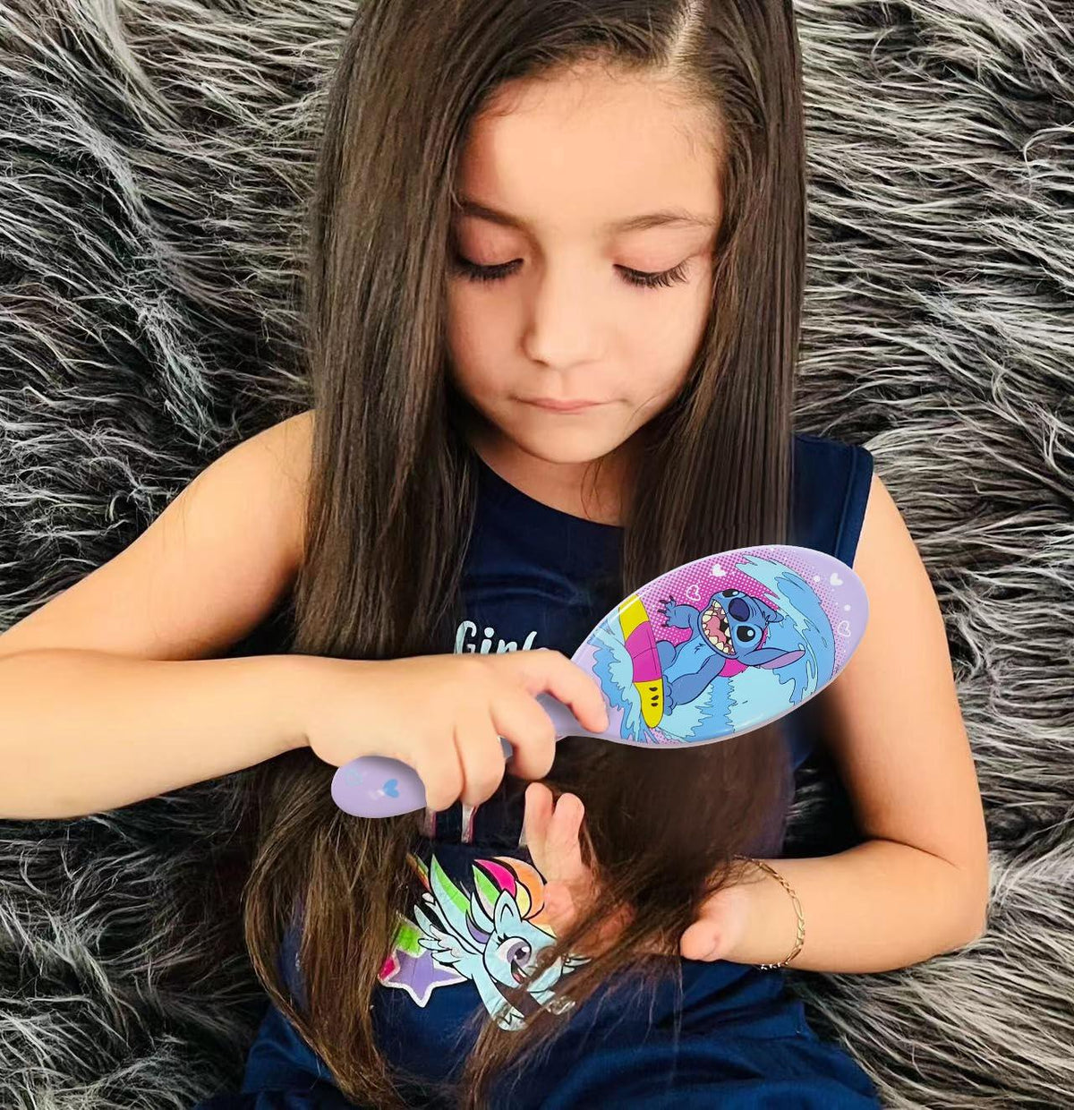 Girl brushing hair with Stitch hair brush, LuvHer Shop Disney girls' accessory