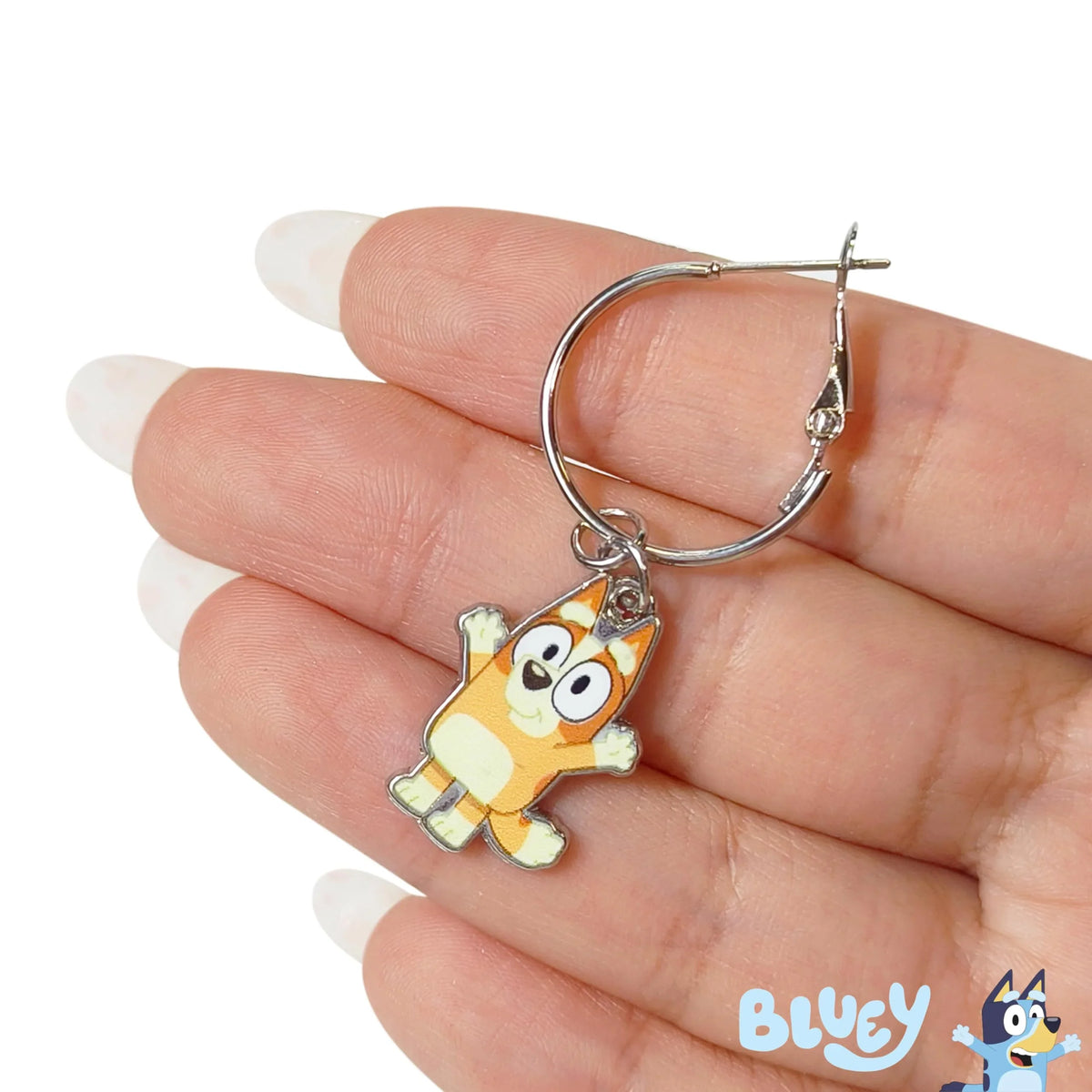 Bluey Bingo Hoop Earring girls' jewelry accessory held in hand, licensed from LuvHer Shop
