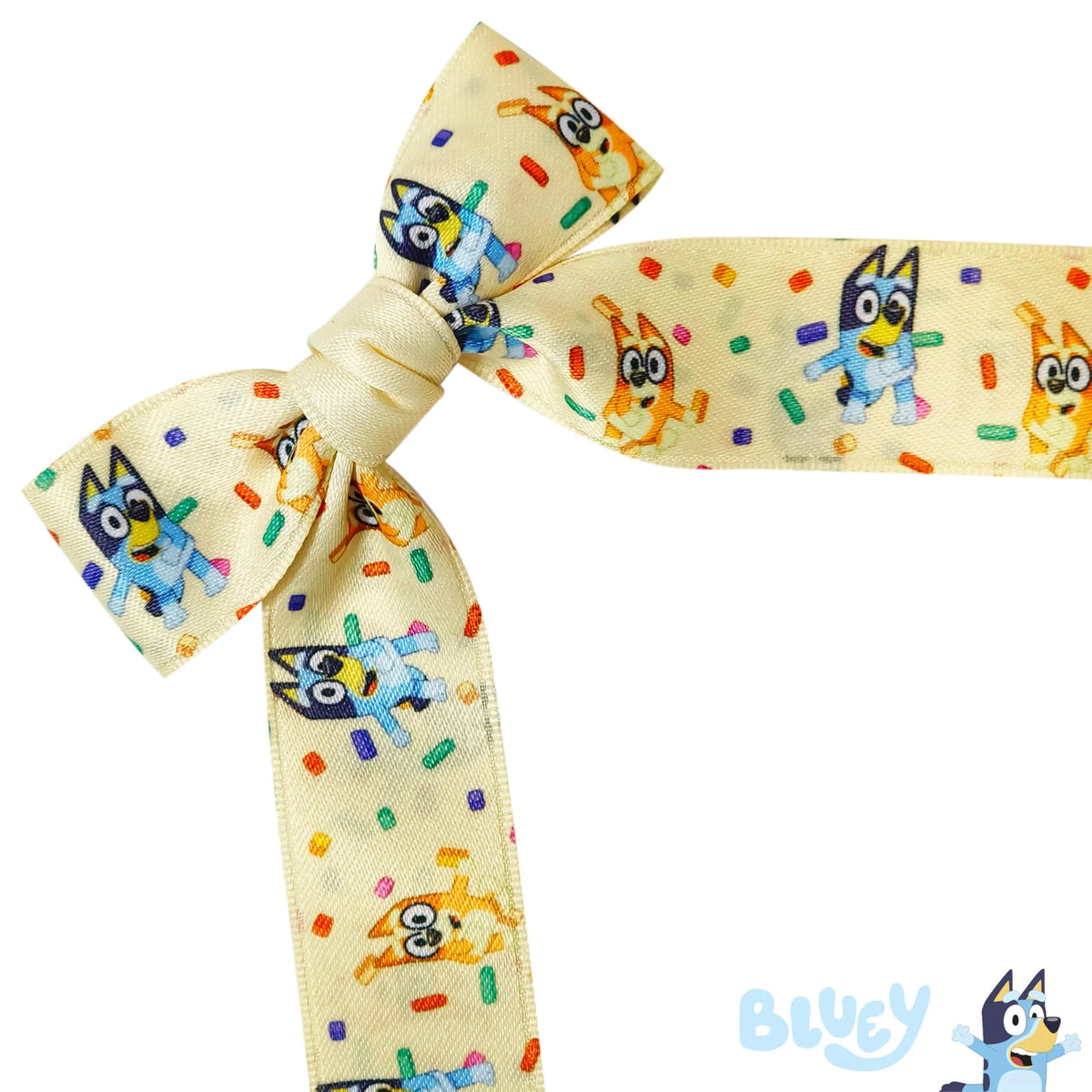 Bluey Confetti Hair Bow for girls featuring Bluey and Bingo characters on cream ribbon