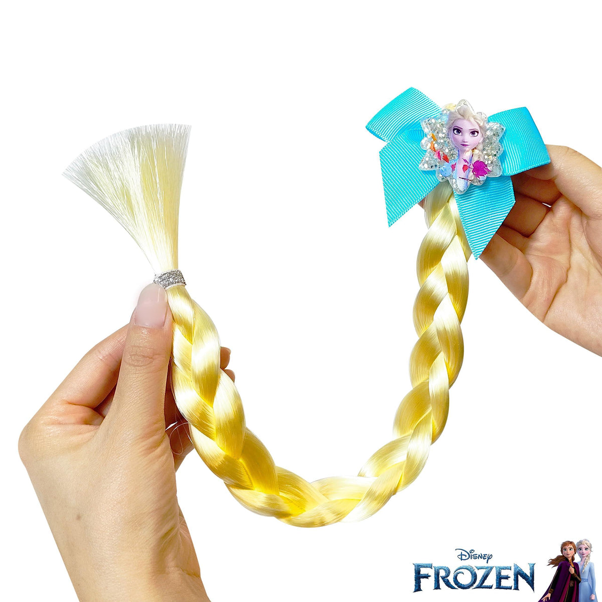 Disney Frozen Elsa Hair Braid Clip with blue bow, character image, held in hands, LuvHer Shop