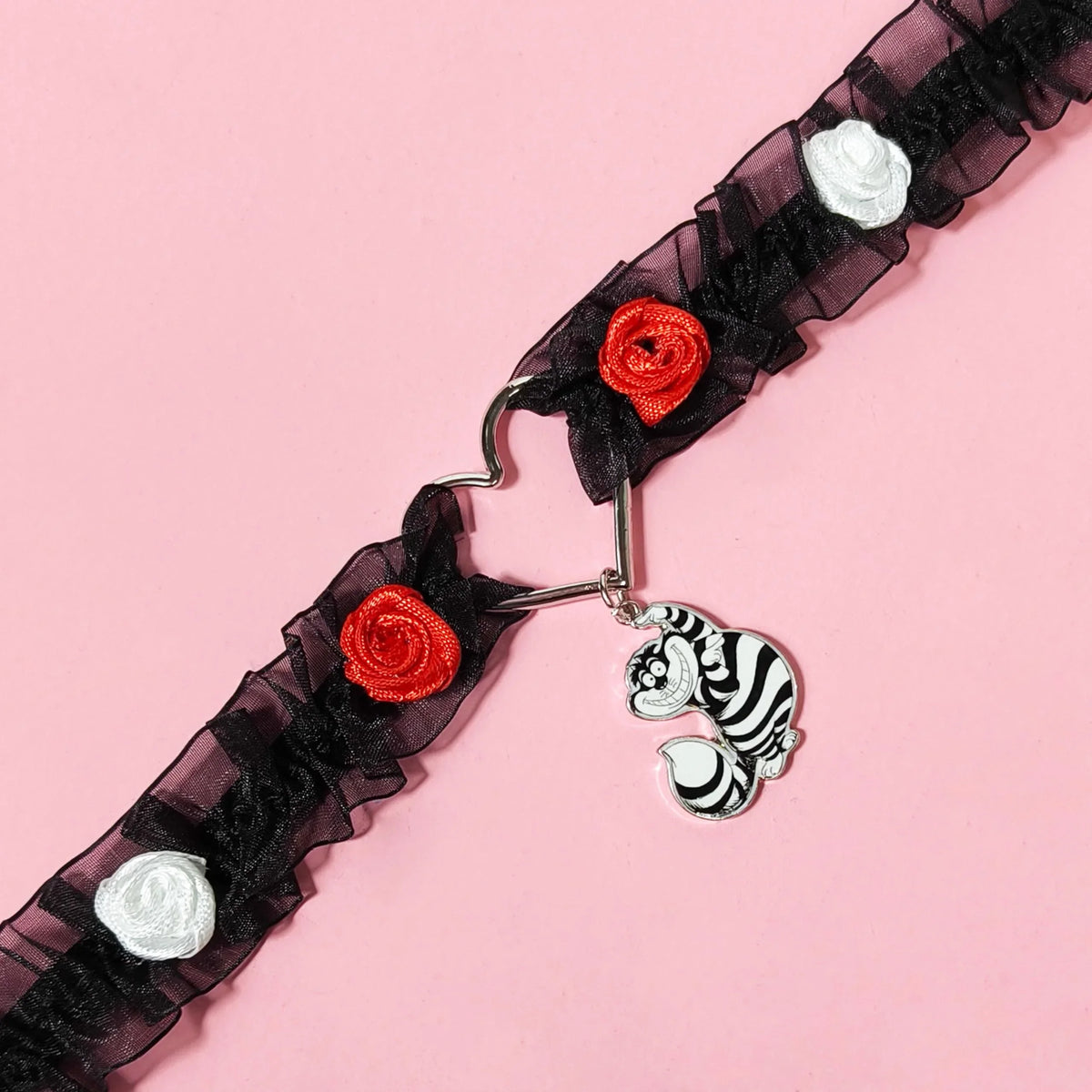 Disney Cheshire Cat black ruffle choker with heart clasp and red, white rose accents from LuvHer Shop