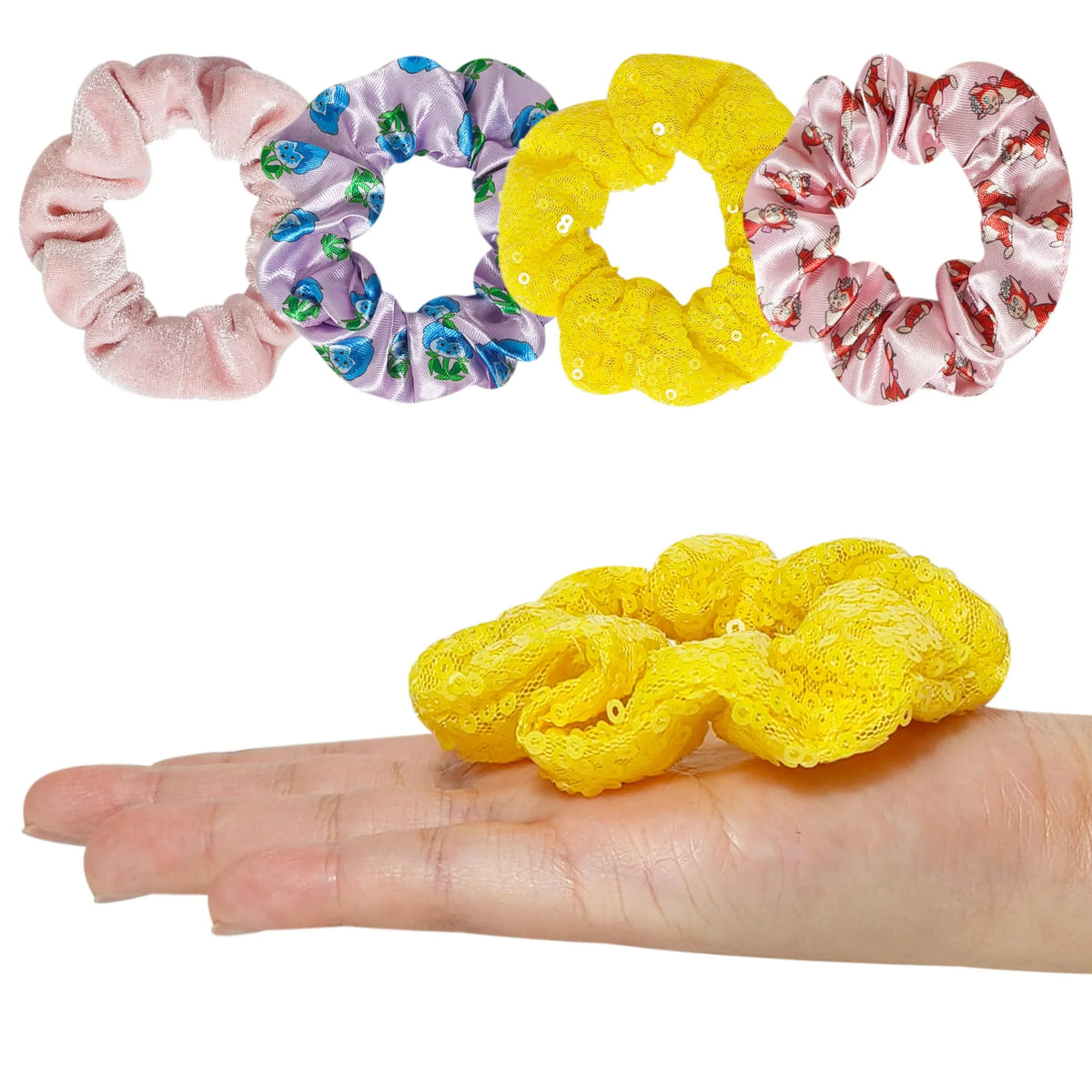 LuvHer Shop hair scrunchie set with pink, purple, yellow, and cartoon designs on a hand