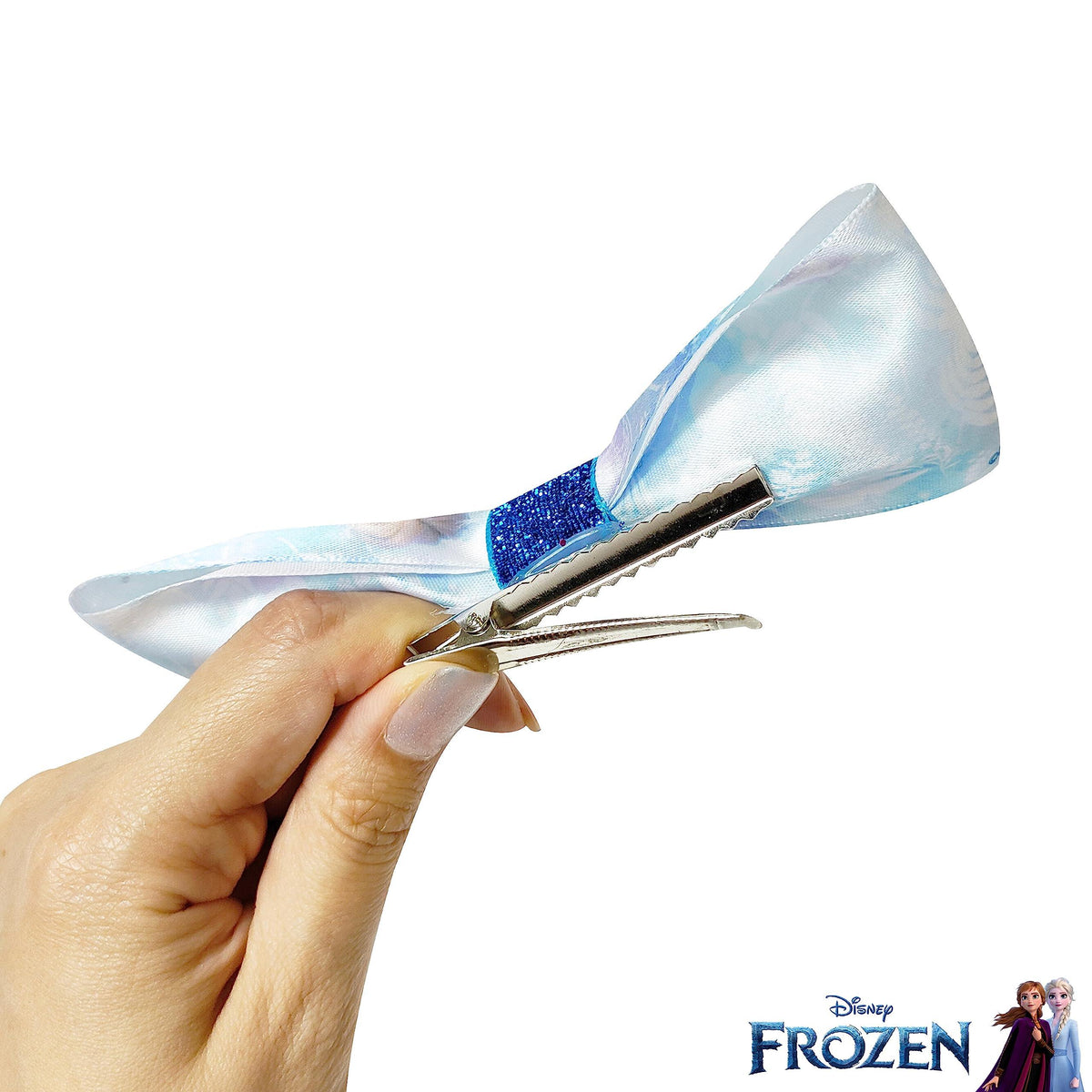 Disney Frozen hair bow clip for girls, blue and white satin accessory held in hand, LuvHer Shop