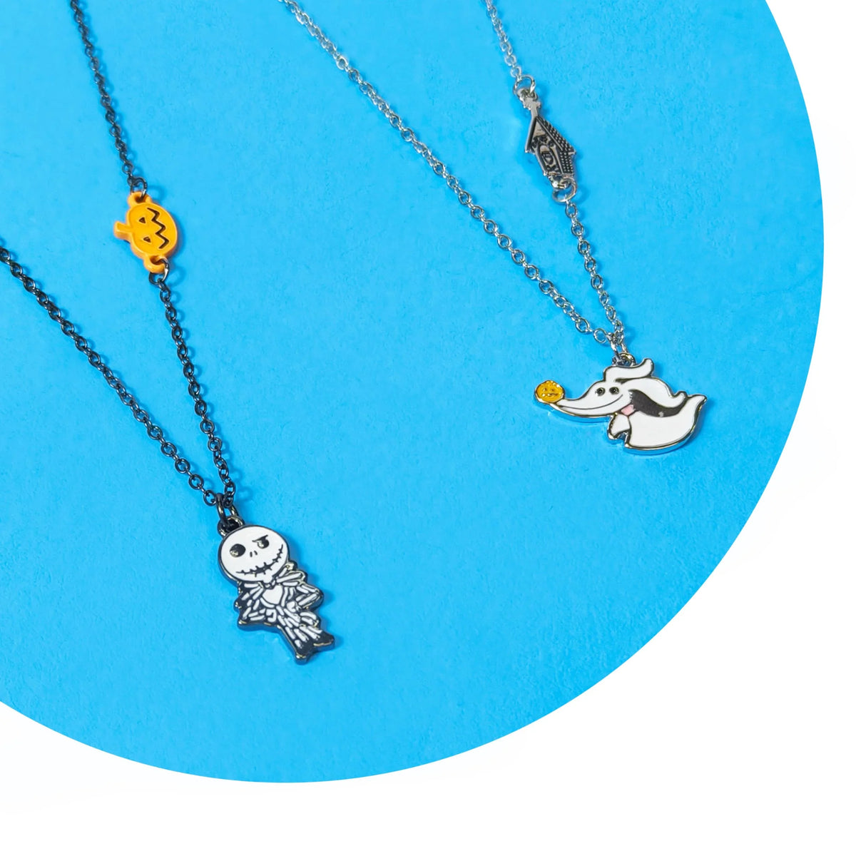 Disney Jack and Zero Necklace Set featuring Jack Skellington and Zero charms on blue background
