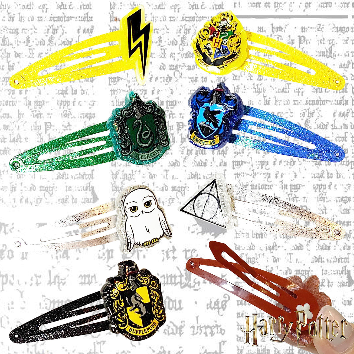 Harry Potter hair snap clip set featuring Hogwarts, Hufflepuff, Slytherin, Ravenclaw, Hedwig, and lightning bolt designs from LuvHer Shop.