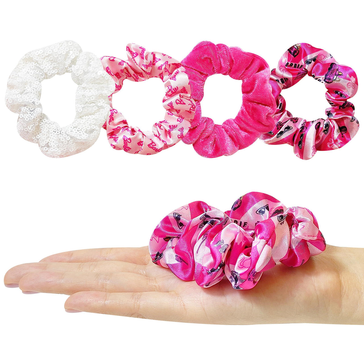 Barbie Scrunchies set with pink and white designs displayed on a hand, LuvHer Shop girls' accessories
