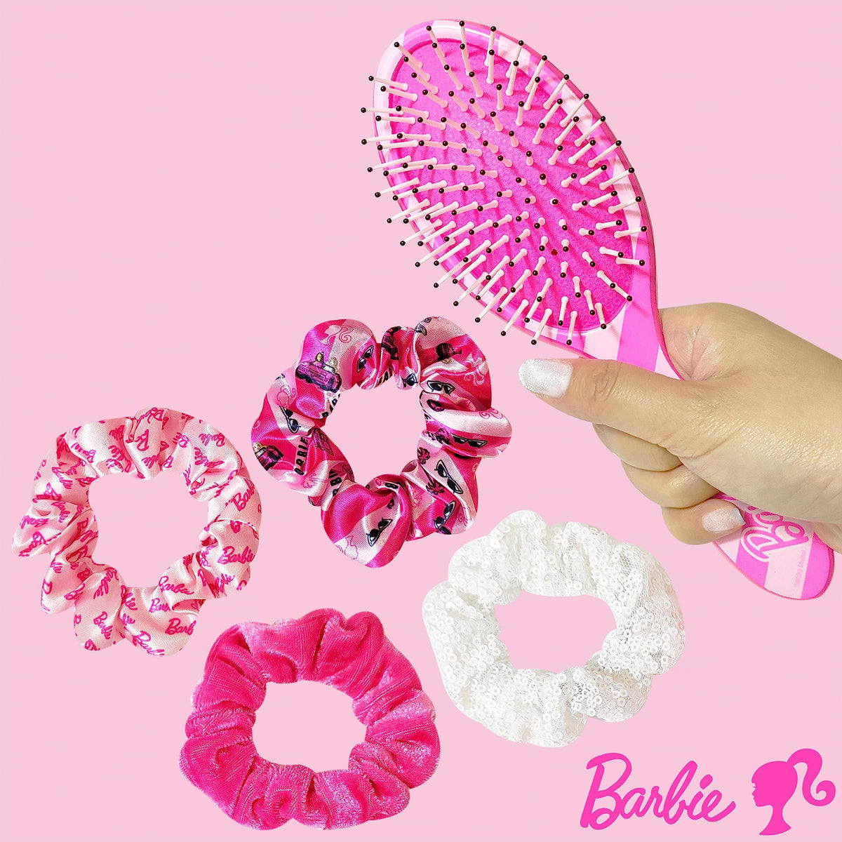 Barbie hair brush and scrunchies set with pink and white designs on pink background from LuvHer Shop