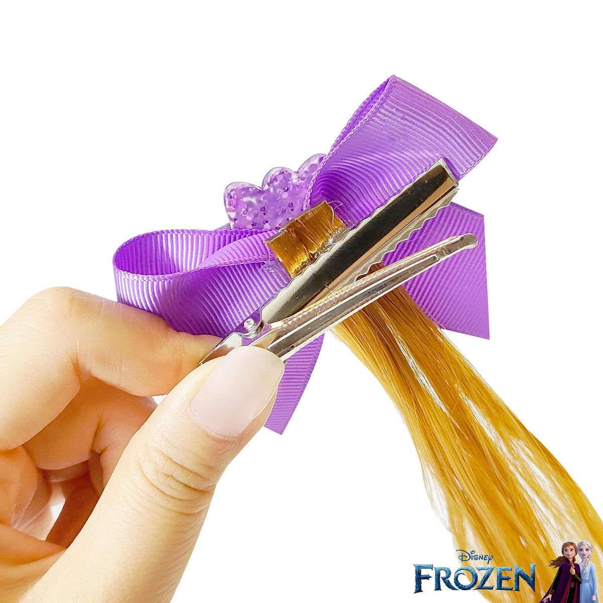 Disney Frozen Hair Bow Clip with yellow strand, purple ribbon, and glitter heart accent
